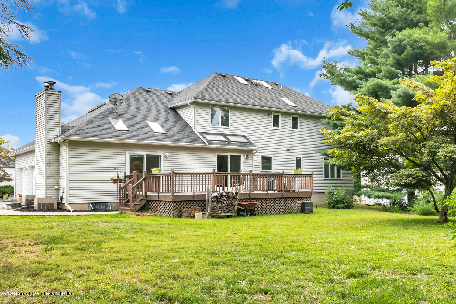 38 Knob Hill Road Morganville, NJ 07751 - Photo 31 of 35 a front view of a house with a yard