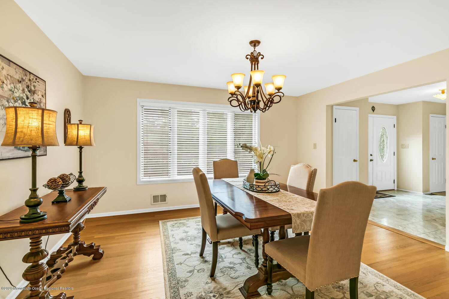 38 Knob Hill Road Morganville, NJ 07751 - Photo 6 of 35 a view of a dining room with furniture and wooden floor