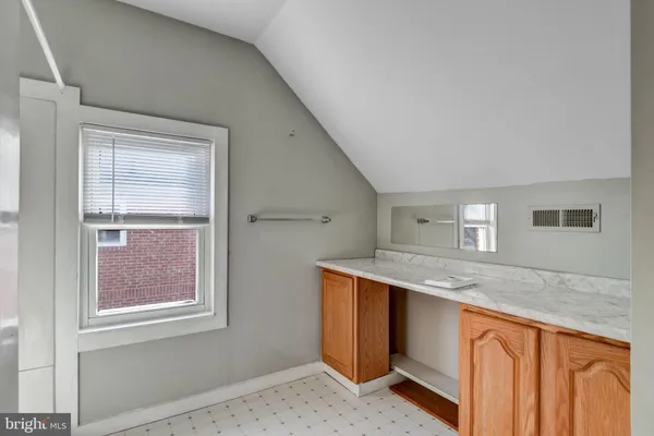 a view of a kitchen cabinets a sink and dishwasher
