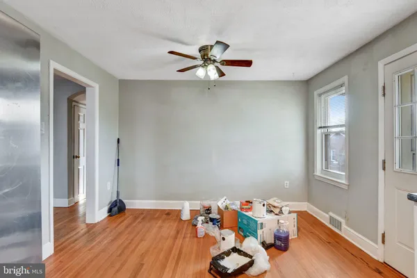 a bed room with a bed and a window