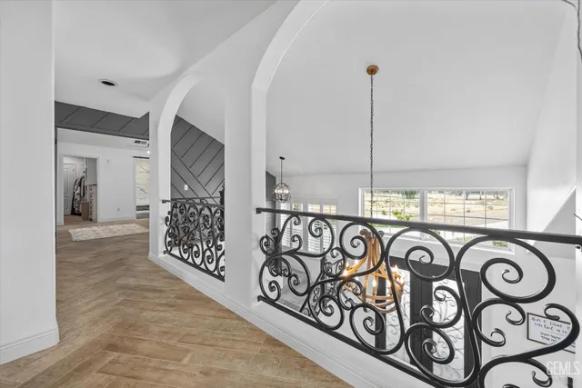 a bathroom with a sink vanity granite tub and shower