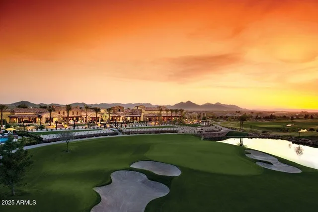 a view of a lake with a yard