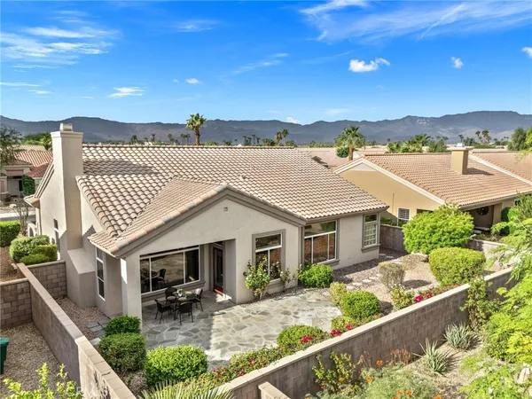 a view of house with outdoor space