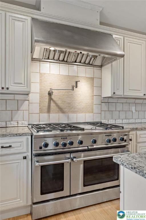 1790 Friedensville Road Bethlehem, PA 18015 - Photo 21 of 50 a stove top oven sitting inside of a kitchen