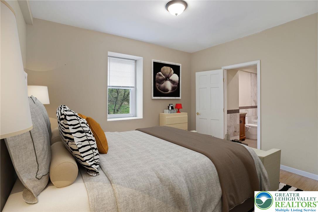 1790 Friedensville Road Bethlehem, PA 18015 - Photo 29 of 50 a bedroom with a bed and a window