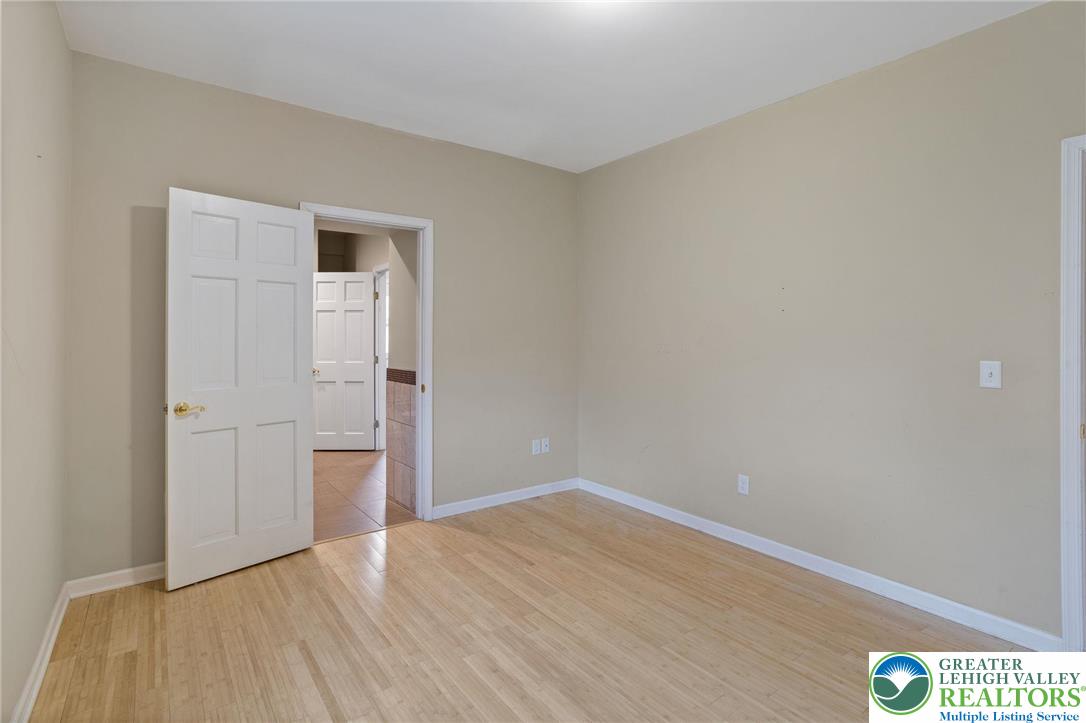 1790 Friedensville Road Bethlehem, PA 18015 - Photo 32 of 50 wooden floor in an empty room