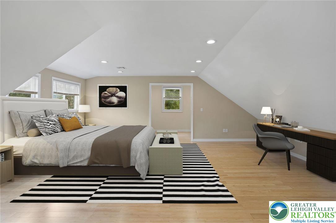 1790 Friedensville Road Bethlehem, PA 18015 - Photo 48 of 50 a bedroom with a bed and a couch