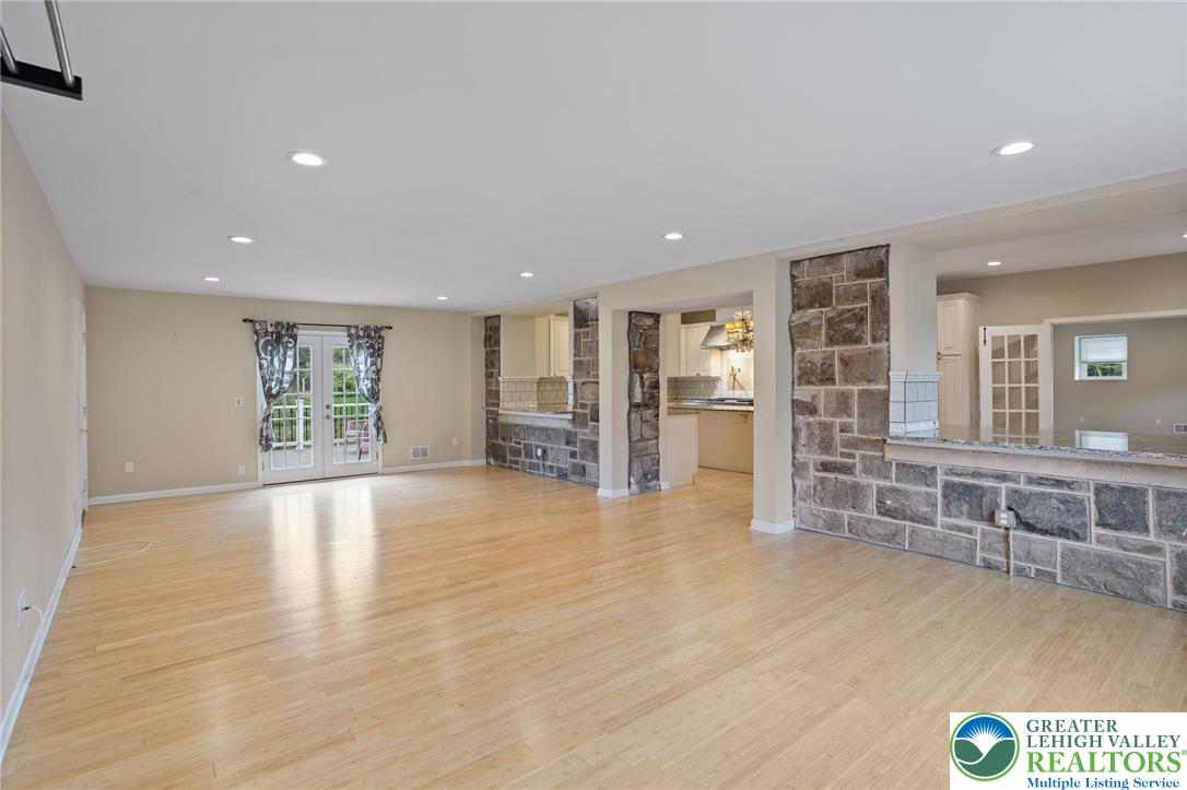 1790 Friedensville Road Bethlehem, PA 18015 - Photo 6 of 50 a view of an empty room with kitchen and window