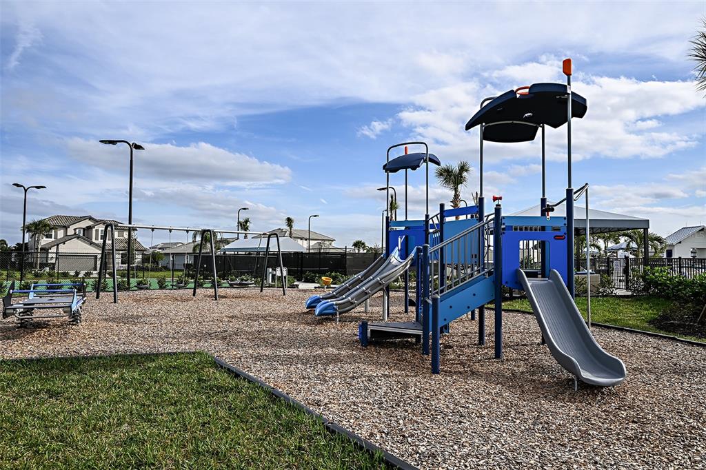 4711 Winsome Way Lakewood Ranch, FL 34211 - Photo 12 of 18 a view of a park with a slide