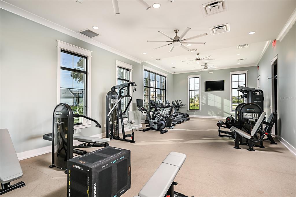 4711 Winsome Way Lakewood Ranch, FL 34211 - Photo 16 of 18 a view of a room with gym equipment