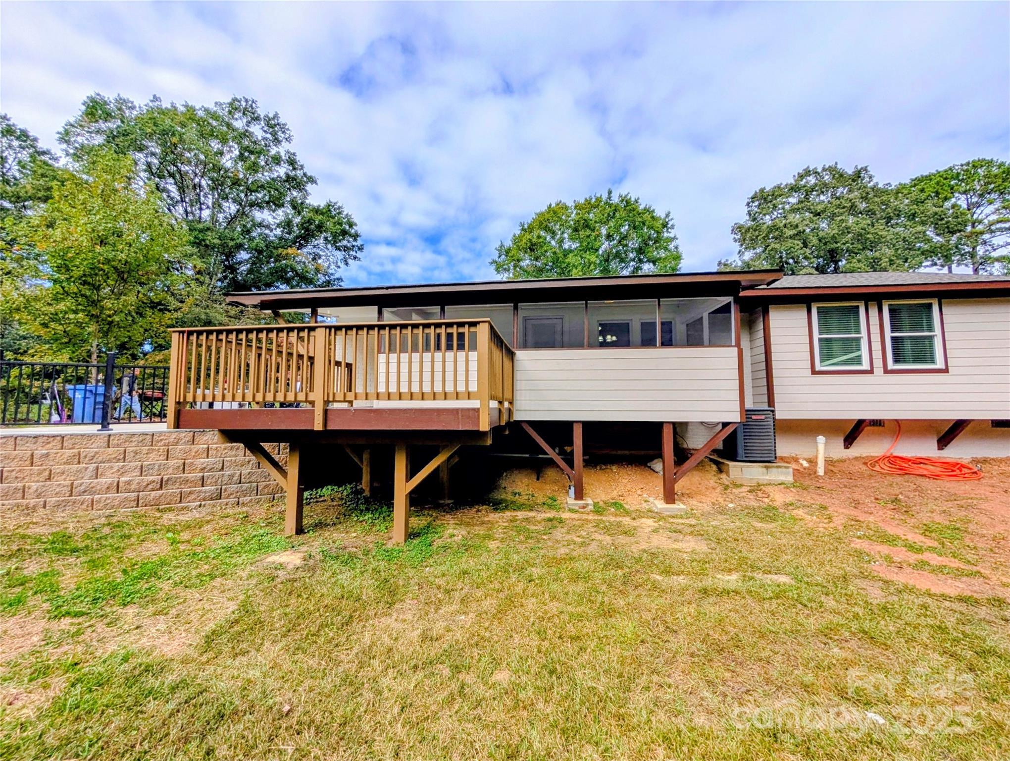 3220 Jonesberry Road Matthews, NC 28105 - Photo 1 of 27 a view of house with backyard and seating area