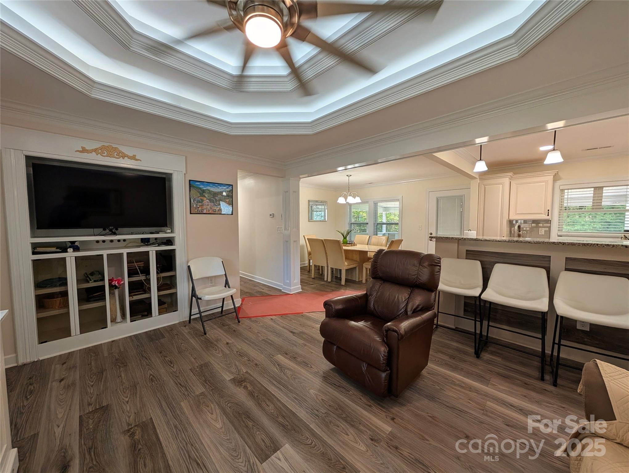 3220 Jonesberry Road Matthews, NC 28105 - Photo 13 of 27 a living room with furniture and a flat screen tv