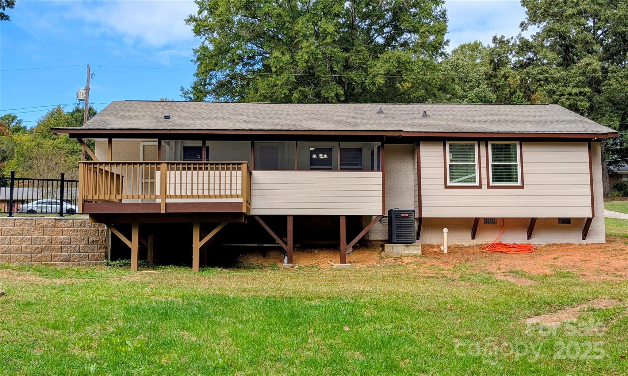 3220 Jonesberry Road Matthews, NC 28105 - Photo 16 of 27 a front view of a house with a garden