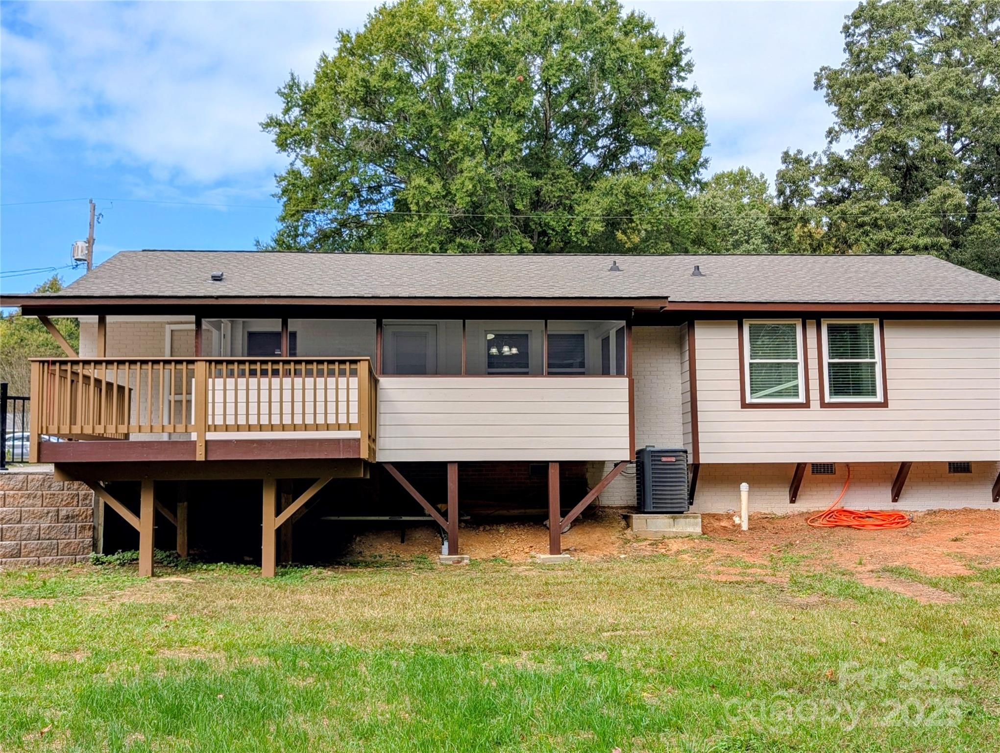 3220 Jonesberry Road Matthews, NC 28105 - Photo 27 of 27 a backyard of a house with wooden deck and furniture