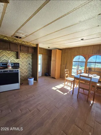 a view of a livingroom with furniture