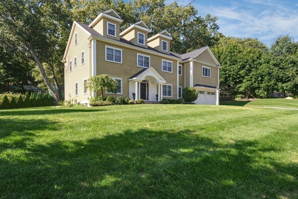 5 Cutler Farm Road Lexington, MA 02421 - Photo 1 of 39 a front view of a house with a yard