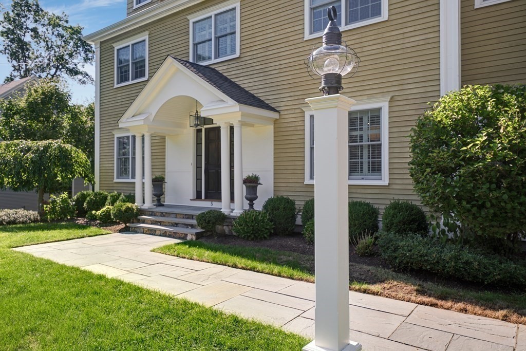 5 Cutler Farm Road Lexington, MA 02421 - Photo 2 of 39 a front view of a house with garden