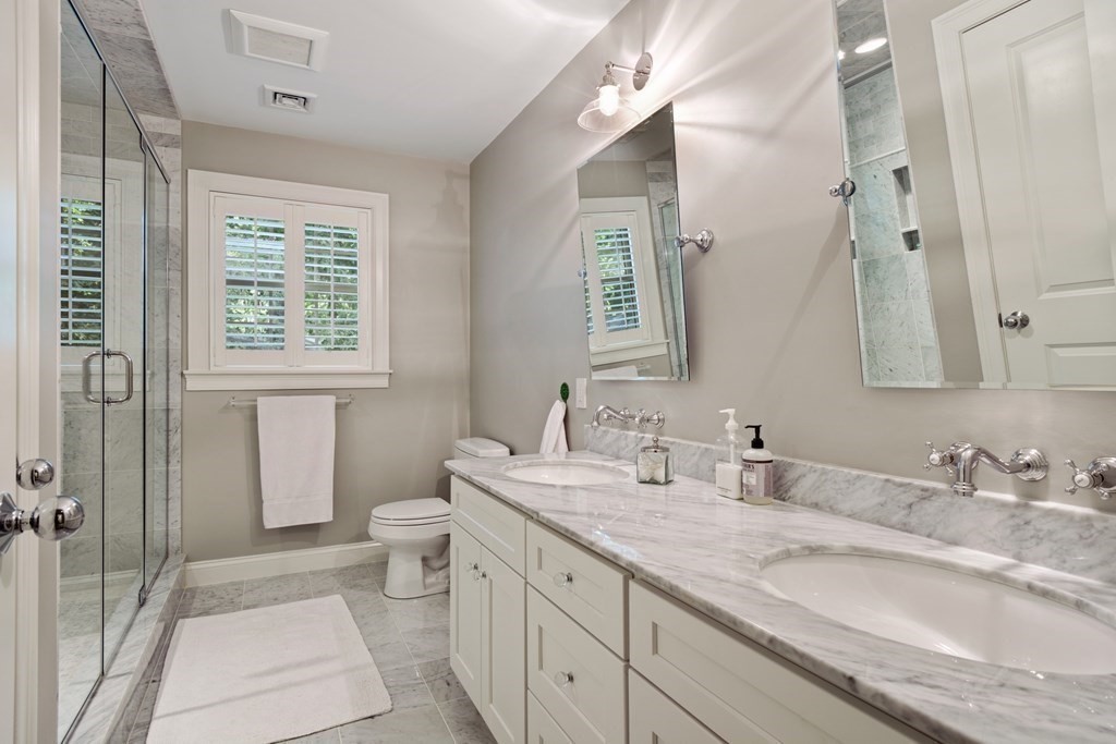 5 Cutler Farm Road Lexington, MA 02421 - Photo 25 of 39 a bathroom with a granite countertop sink toilet and shower