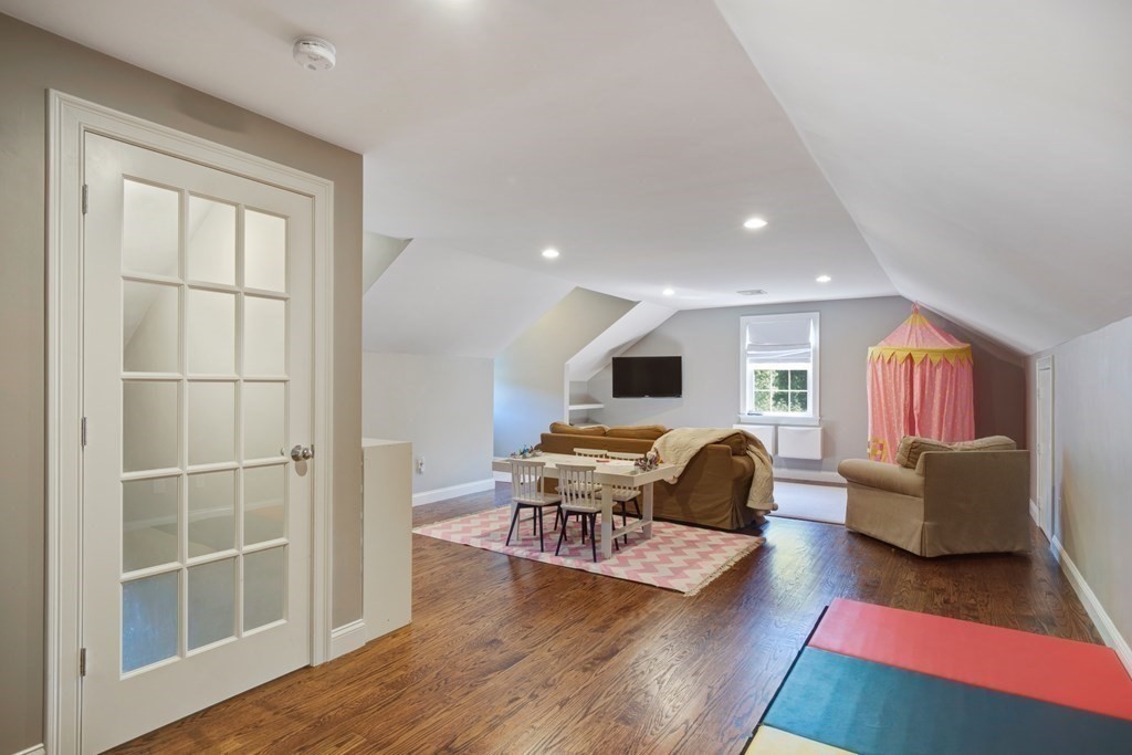 5 Cutler Farm Road Lexington, MA 02421 - Photo 33 of 39 a living room with furniture and a wooden floor