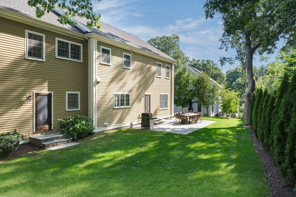 5 Cutler Farm Road Lexington, MA 02421 - Photo 35 of 39 a view of a house with backyard and sitting area