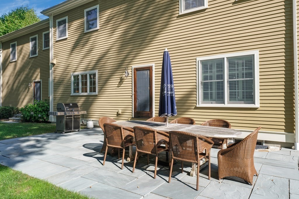5 Cutler Farm Road Lexington, MA 02421 - Photo 36 of 39 a view of a house with backyard and sitting area