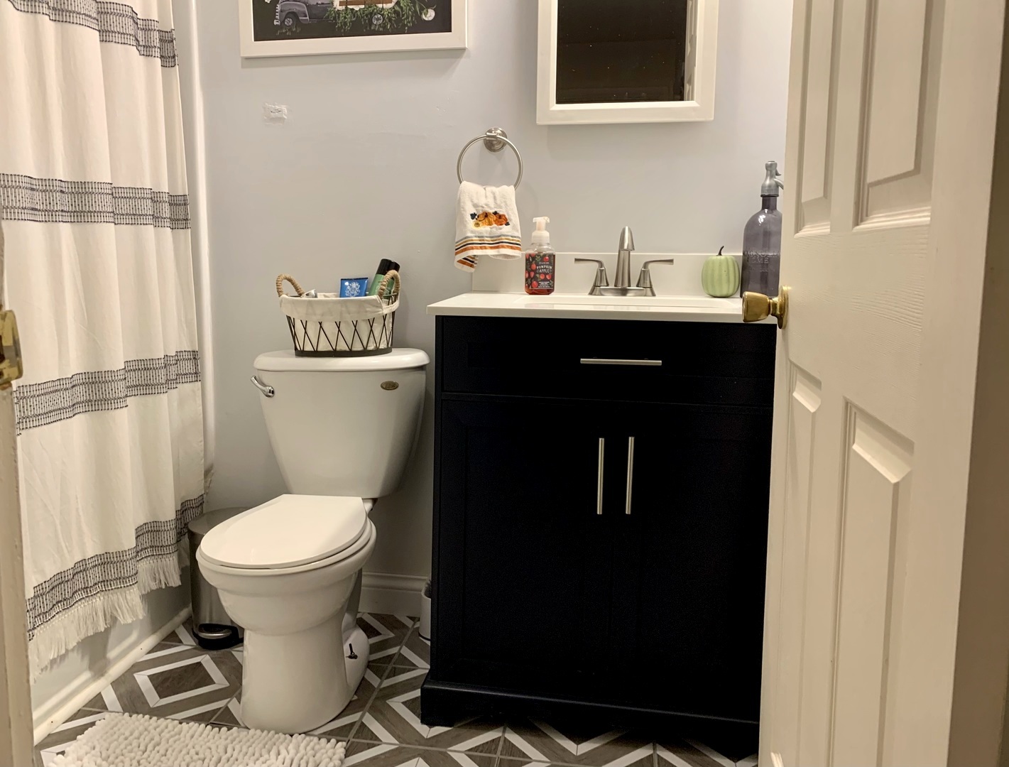 362 Cleveland Avenue Rochelle, IL 61068 - Photo 7 of 12 a bathroom with a sink toilet and a mirror