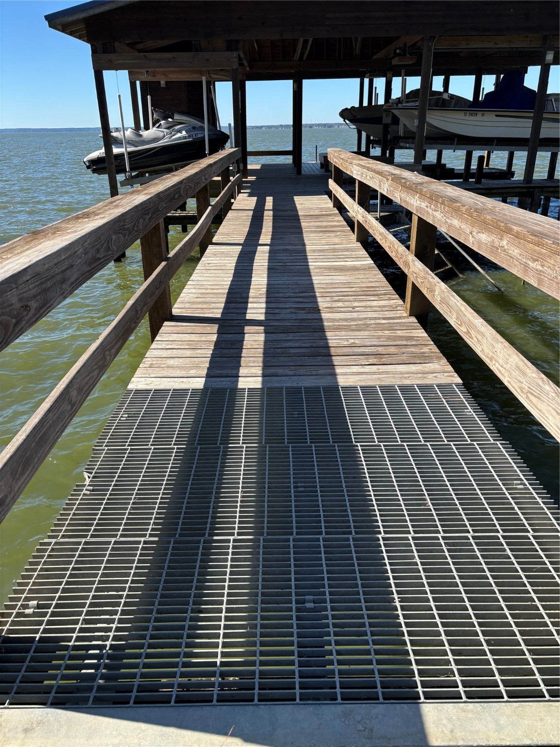 a view of balcony with wooden floor