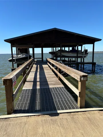 a view of swimming pool with seating area