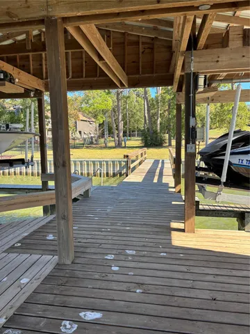 a view of a swimming pool with a porch