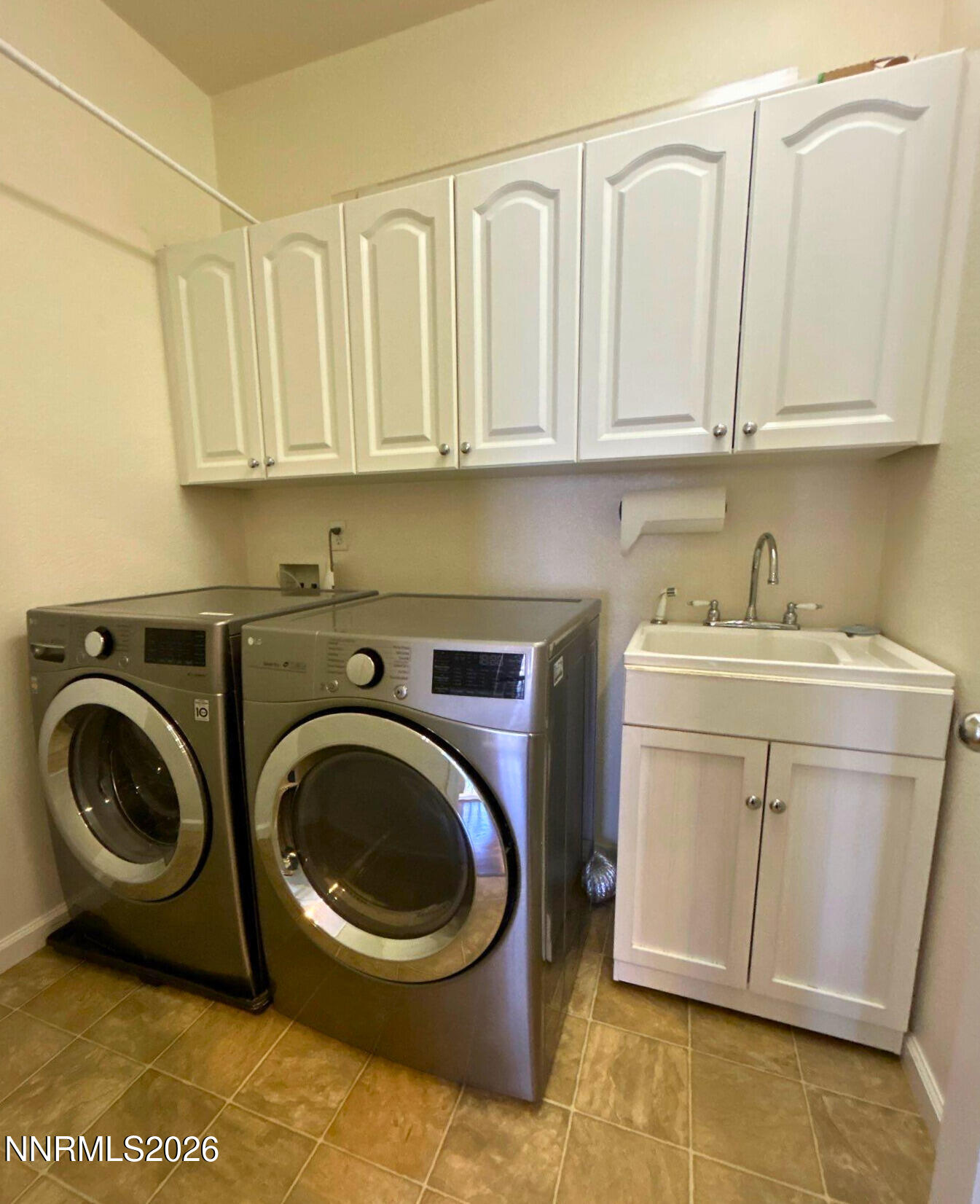 1783 Back Country Road Reno, NV 89521 - Photo 26 of 28 a utility room with sink dryer and washer