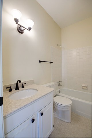 4505 Harding Pike, Unit 106 Nashville, TN 37205 - Photo 19 of 22 a bathroom with a sink a toilet and shower