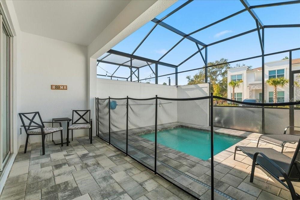 1385 Peaceful Way Clermont, FL 34714 - Photo 26 of 28 a room with view of pool and table