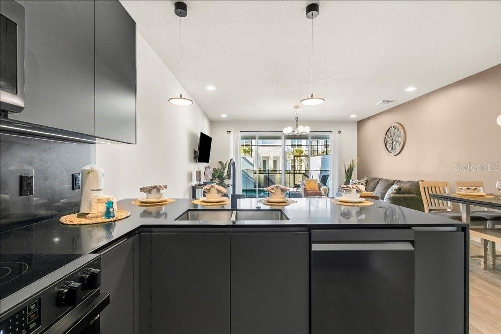 1385 Peaceful Way Clermont, FL 34714 - Photo 8 of 28 a kitchen with sink and stove