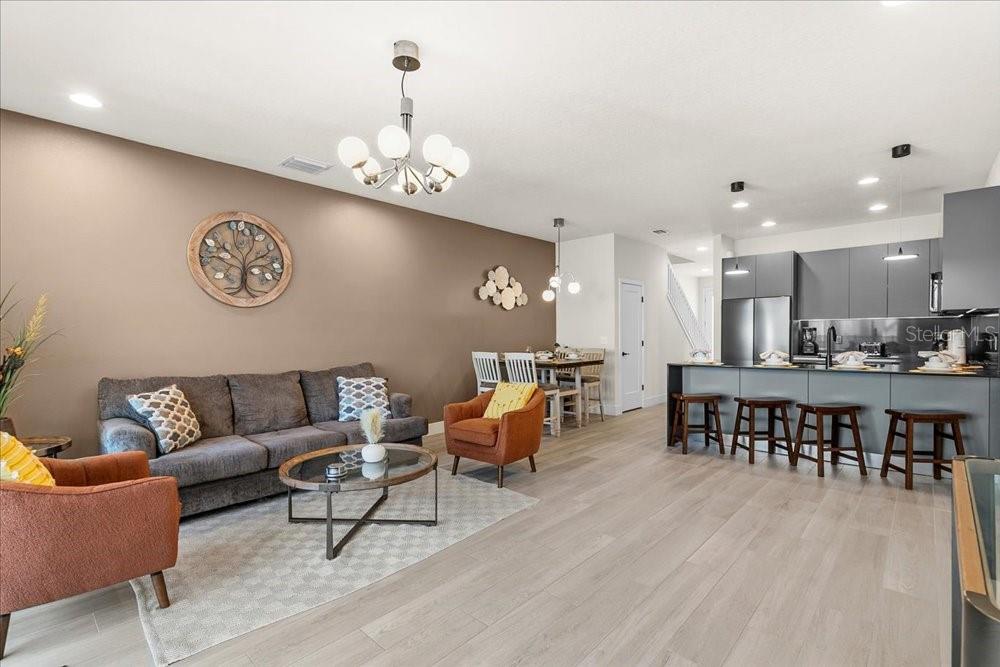 1385 Peaceful Way Clermont, FL 34714 - Photo 10 of 28 a living room with furniture and a table