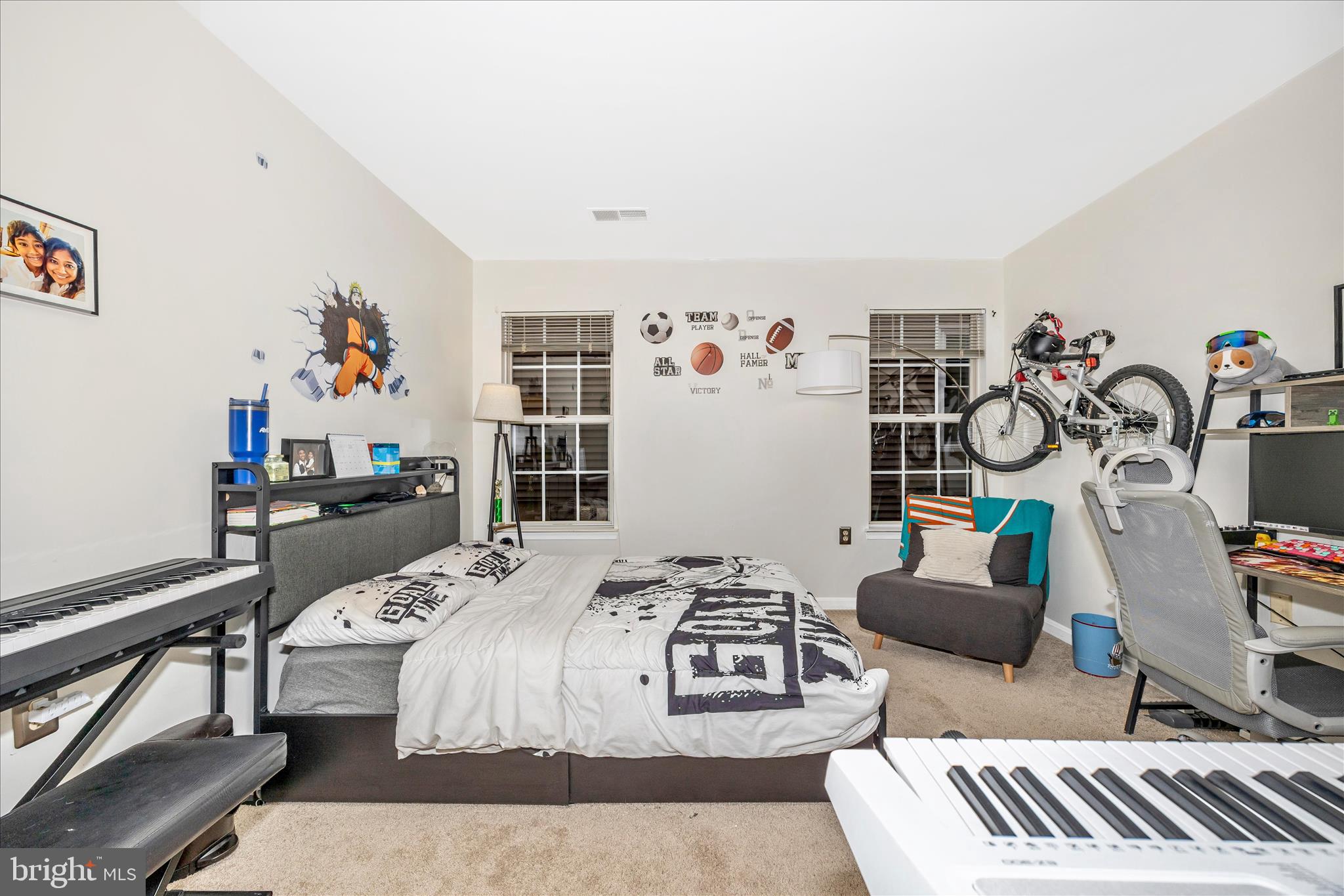 125 Timberbrook Lane, Unit 102 Gaithersburg, MD 20878 - Photo 21 of 38 a bedroom with furniture and a window