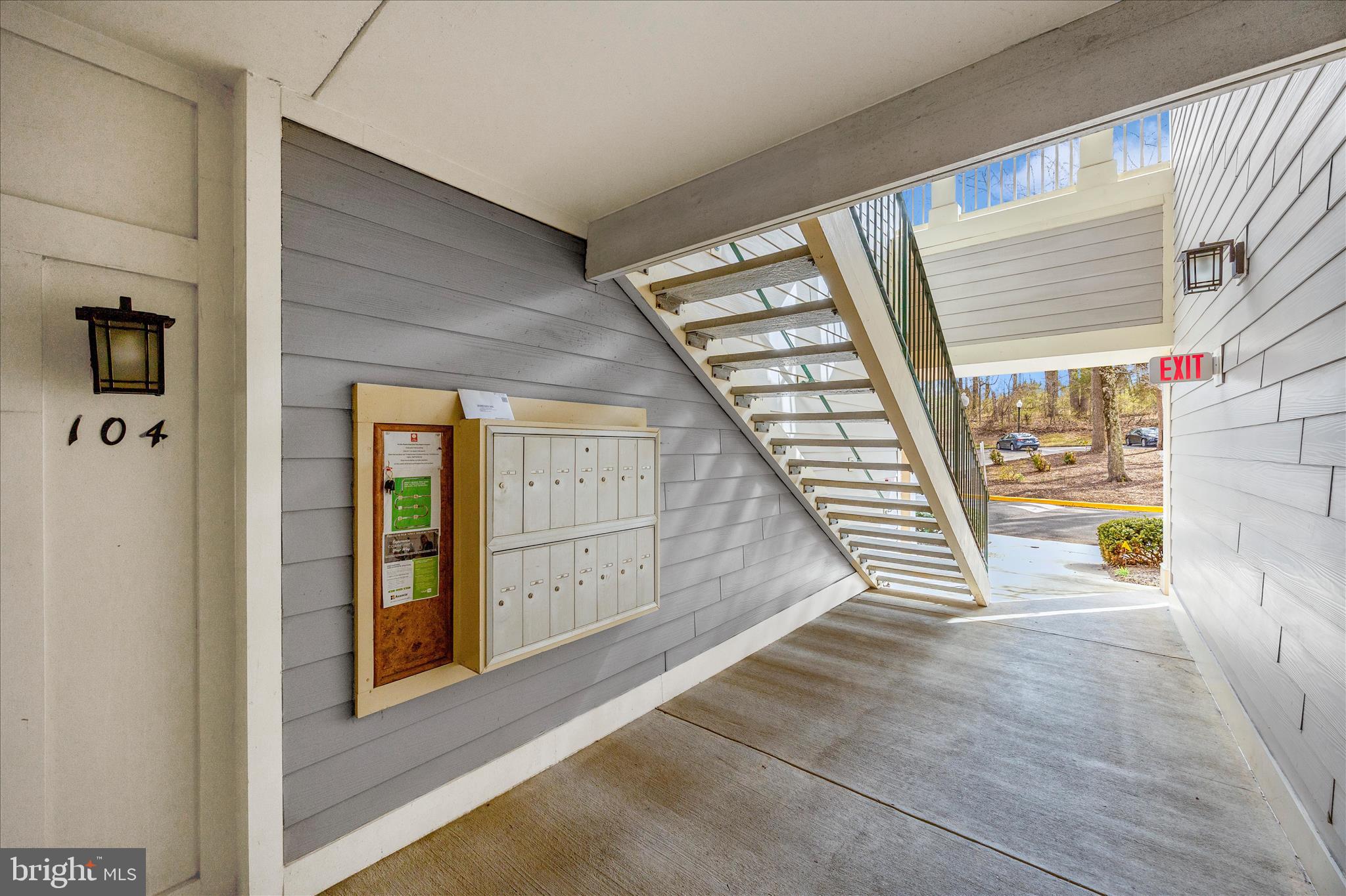 125 Timberbrook Lane, Unit 102 Gaithersburg, MD 20878 - Photo 30 of 38 a view of an entryway with staircase