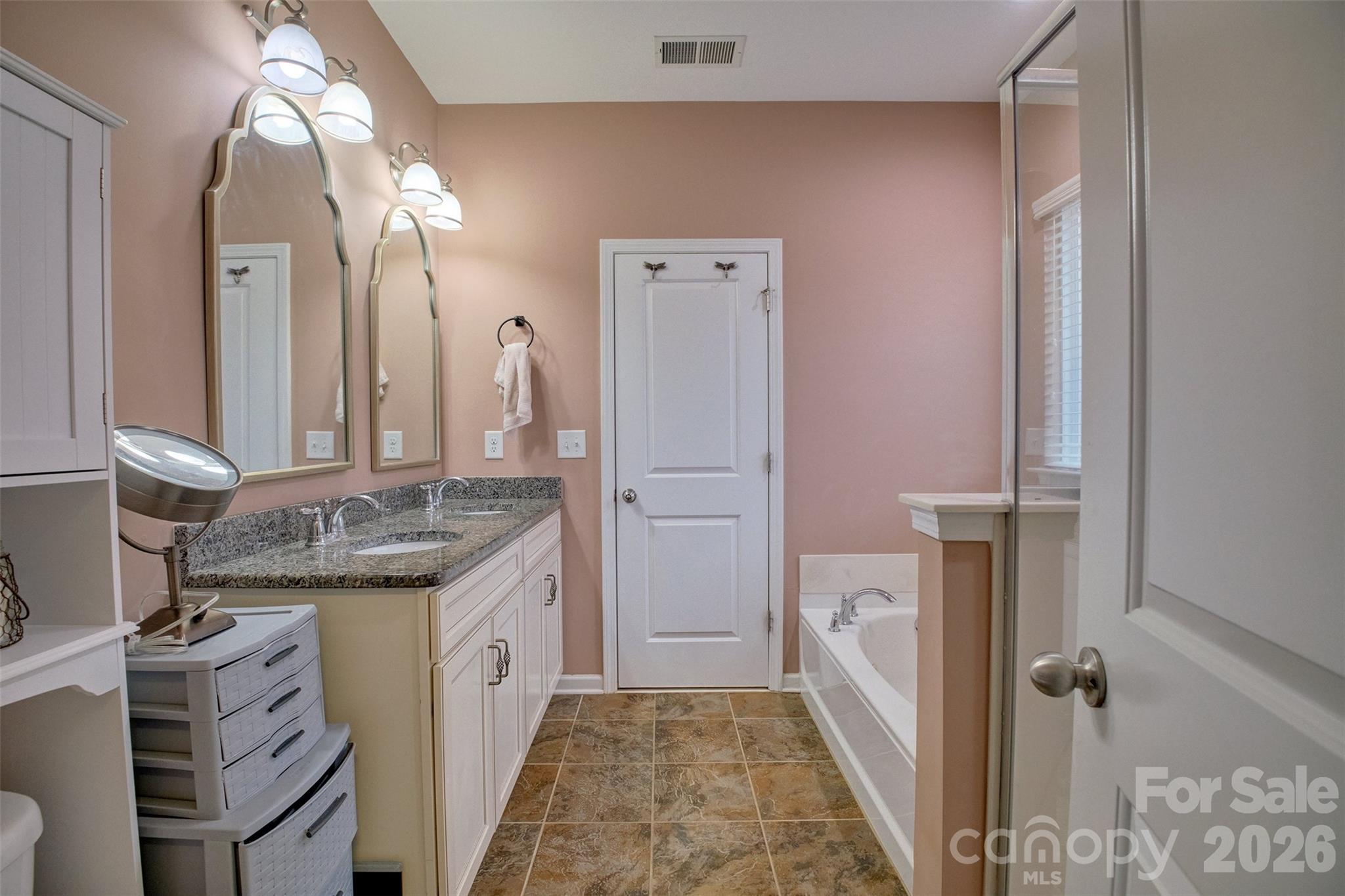 3078 Rhododendron Place Lake Wylie, SC 29710 - Photo 15 of 43 a bathroom with a granite countertop sink and a mirror