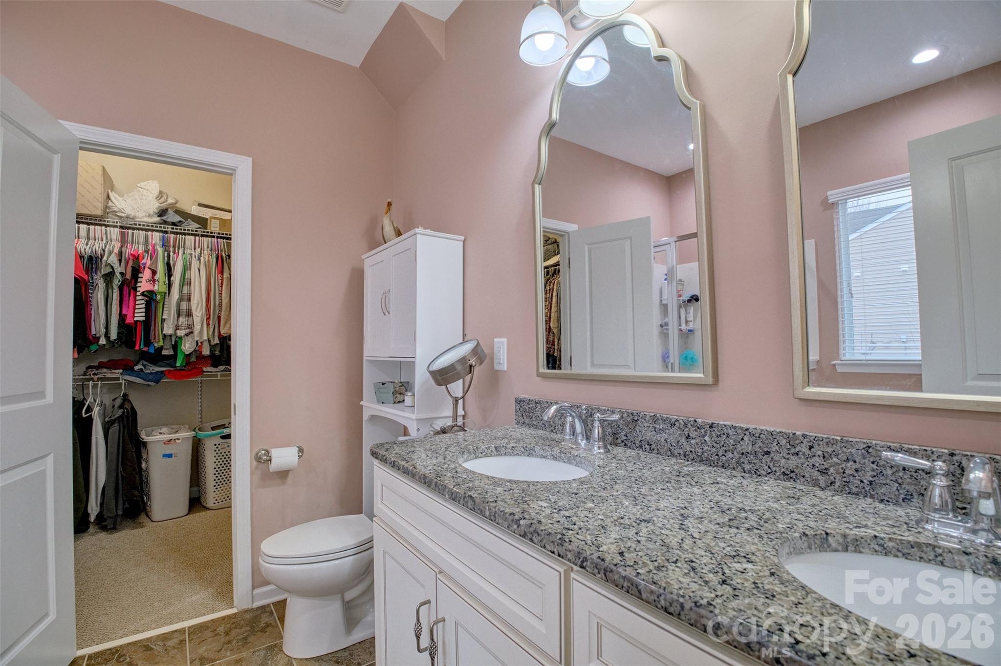 3078 Rhododendron Place Lake Wylie, SC 29710 - Photo 17 of 43 a bathroom with a granite countertop sink vanity mirror and toilet