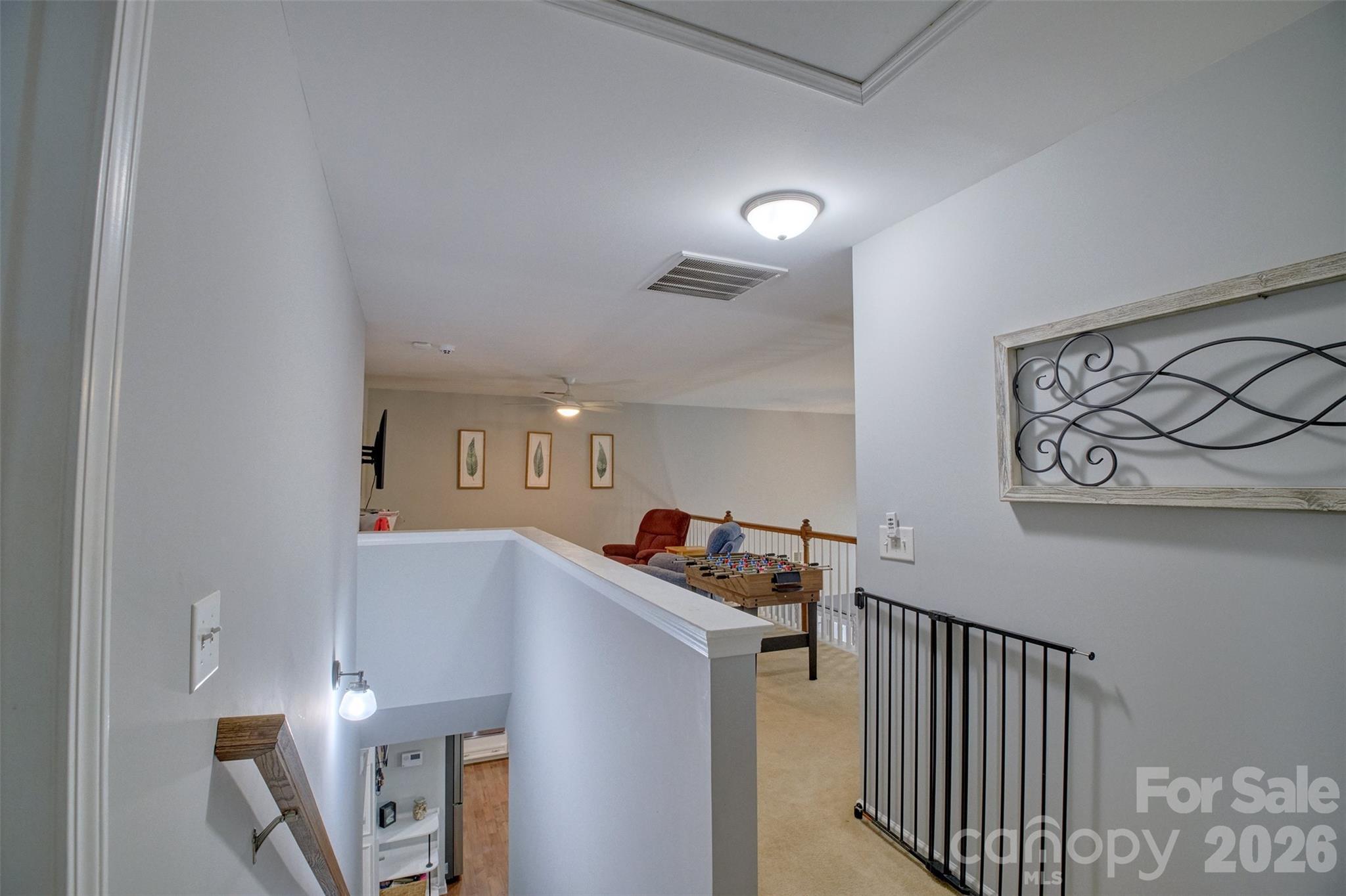 3078 Rhododendron Place Lake Wylie, SC 29710 - Photo 21 of 43 a view of a livingroom with furniture and stairs
