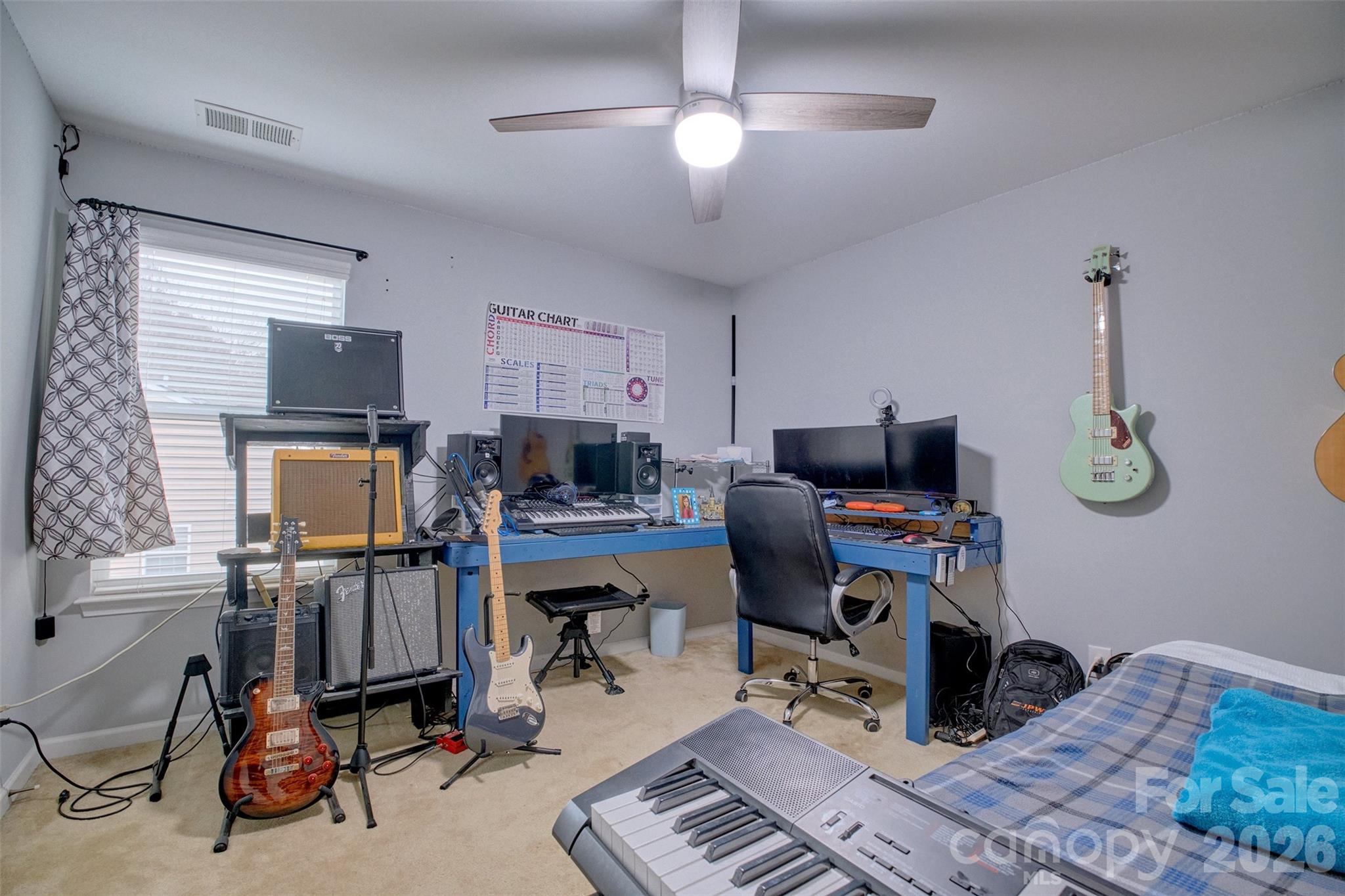 3078 Rhododendron Place Lake Wylie, SC 29710 - Photo 29 of 43 a bedroom with furniture and a window
