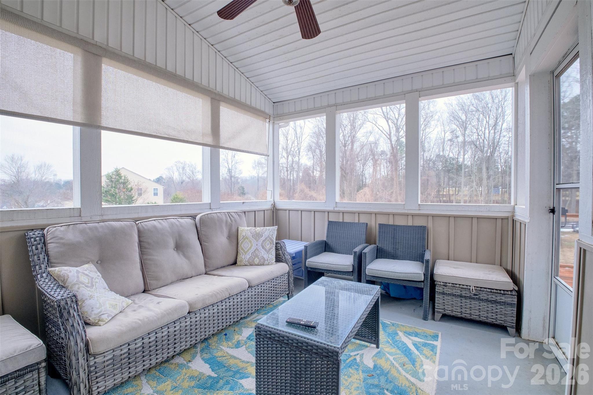 3078 Rhododendron Place Lake Wylie, SC 29710 - Photo 30 of 43 a living room with furniture and a large window
