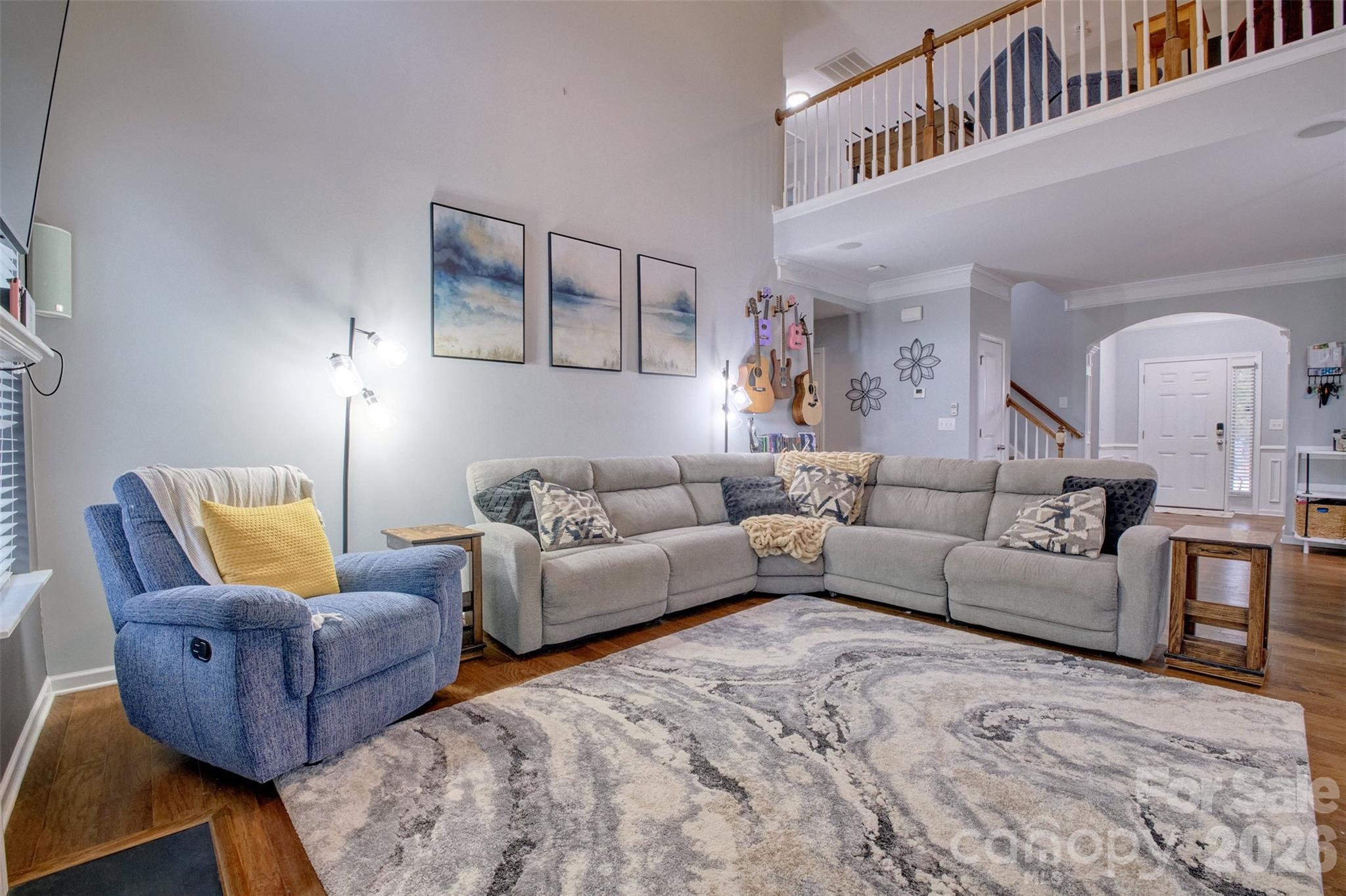 3078 Rhododendron Place Lake Wylie, SC 29710 - Photo 7 of 43 a living room with furniture and a couch