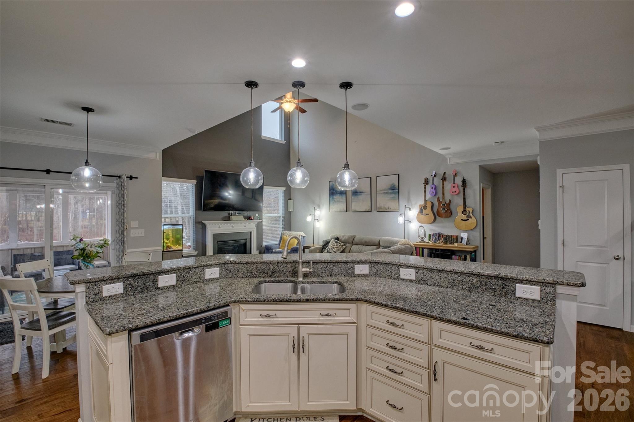 3078 Rhododendron Place Lake Wylie, SC 29710 - Photo 10 of 43 a kitchen with granite countertop a sink and cabinets