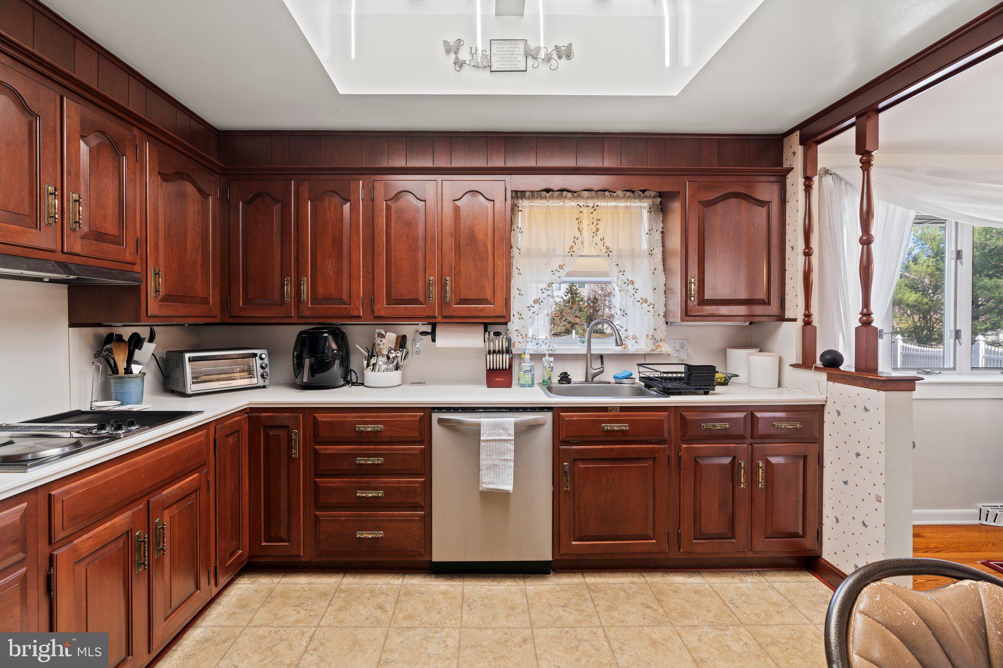694 Egypt Road Phoenixville, PA 19460 - Photo 11 of 38 a kitchen with stainless steel appliances granite countertop a stove sink and cabinets