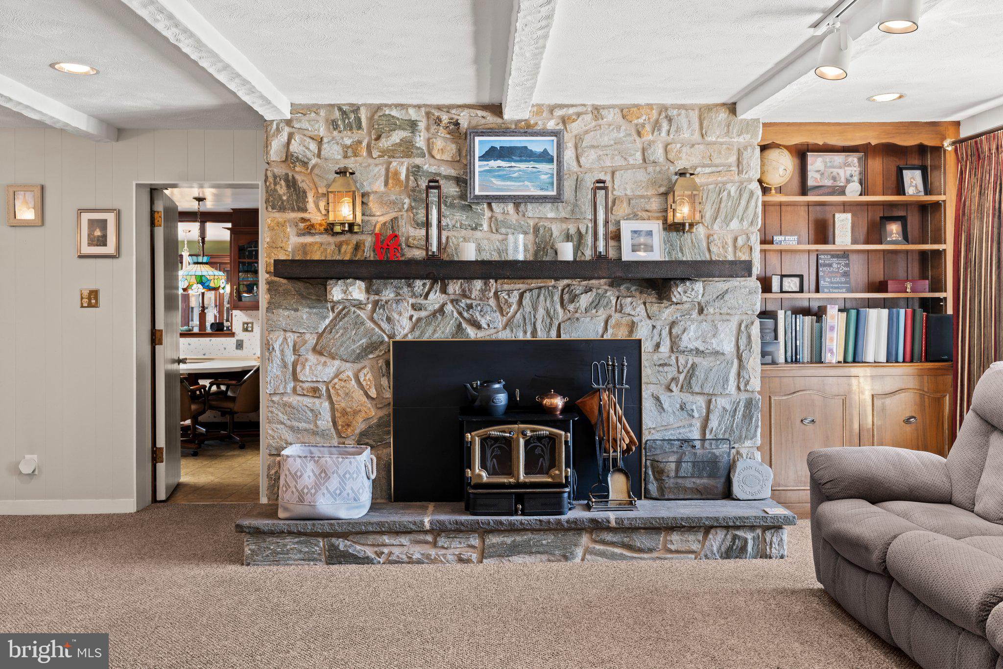 694 Egypt Road Phoenixville, PA 19460 - Photo 13 of 38 a living room with furniture and a fireplace