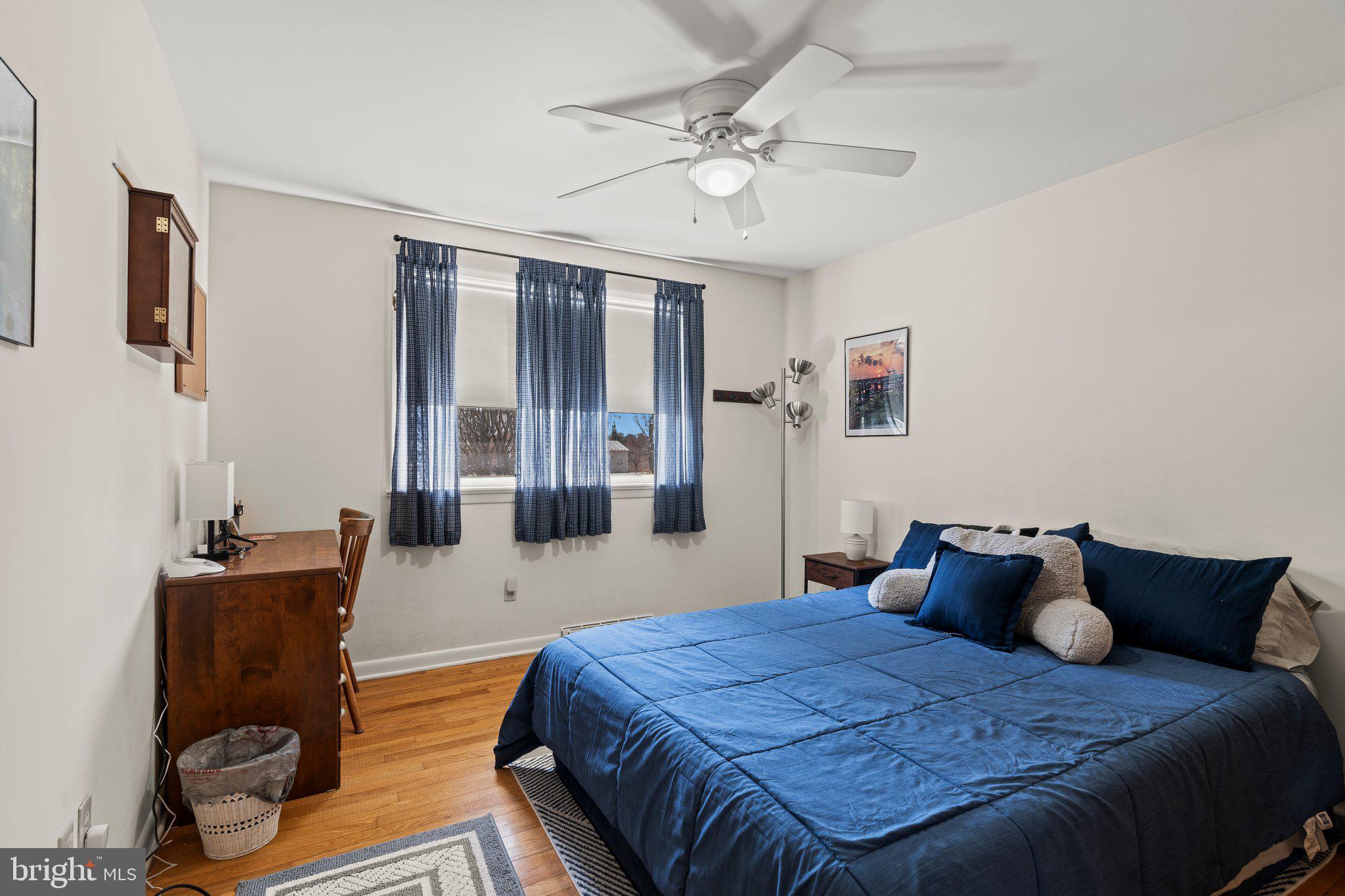694 Egypt Road Phoenixville, PA 19460 - Photo 18 of 38 a bedroom with a bed and wooden floor