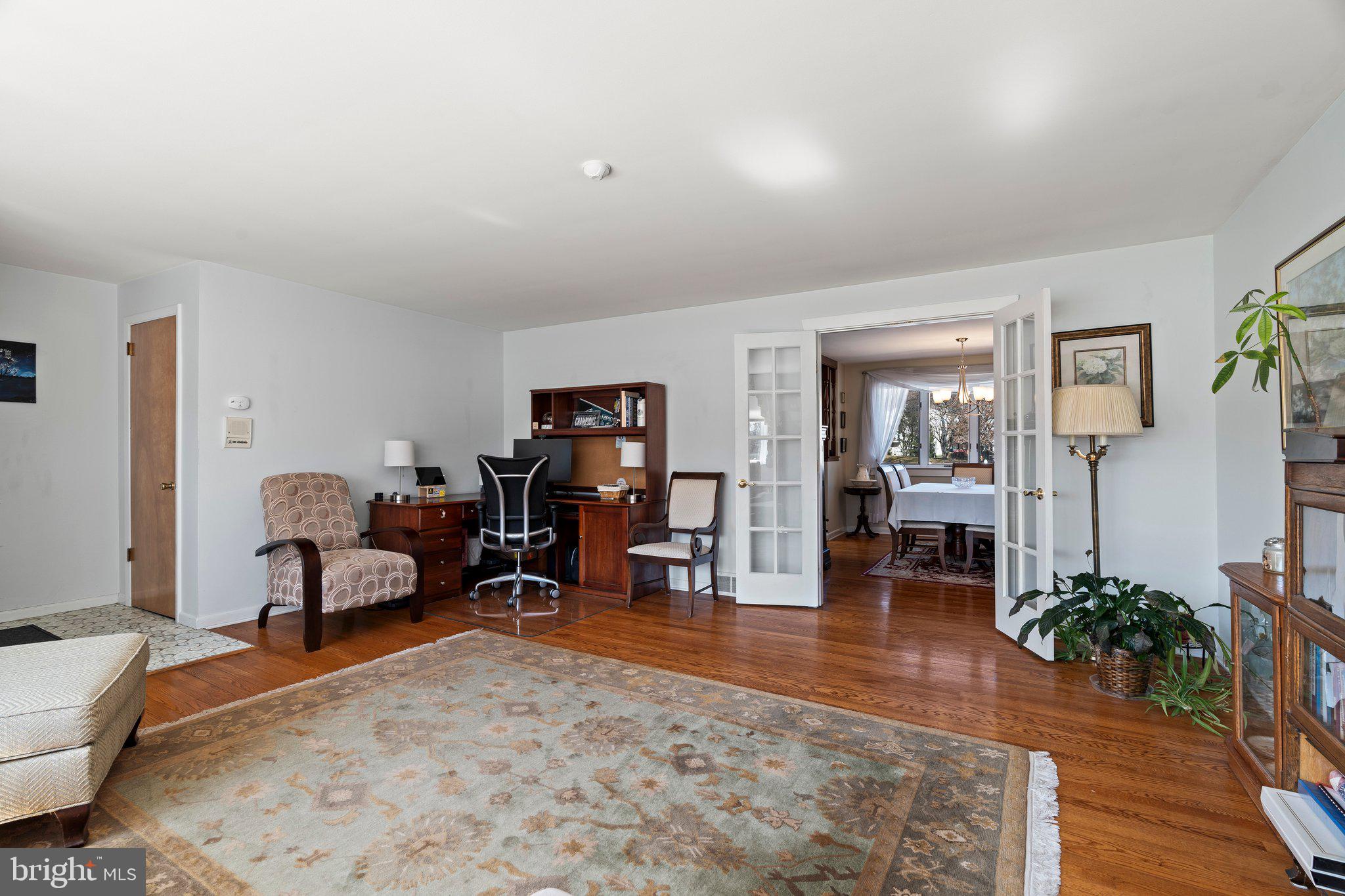 694 Egypt Road Phoenixville, PA 19460 - Photo 5 of 38 a living room with furniture window and wooden floor