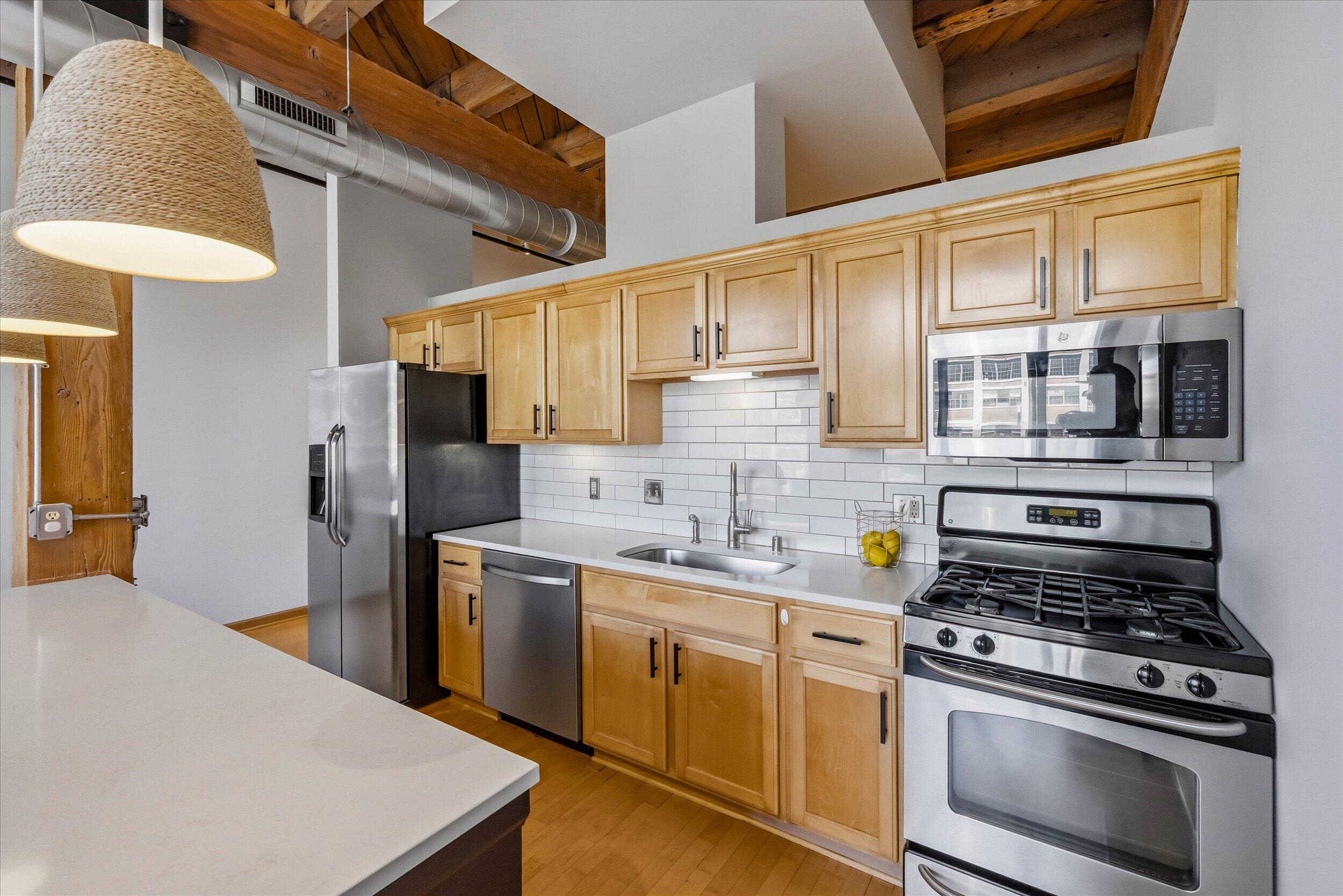 200 South Water Street, Unit 104 Milwaukee, WI 53204 - Photo 6 of 23 Kitchen with SS Appliances