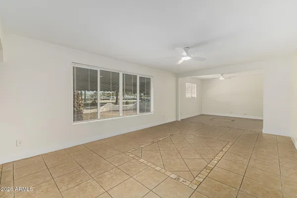 an empty room with windows