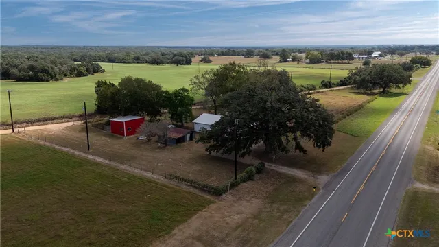 a view of a lake with a yard